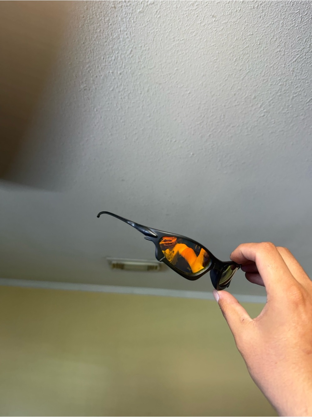 Black Sunglasses with Orange Mirror Lenses - Brand Oakley